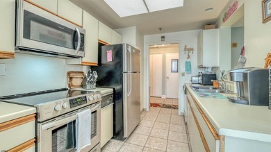 Experience coastal living at its finest in Ocean Club Unit 904-1