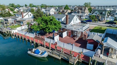Enjoy your summer in this stunning waterfront retreat offering - photo 1