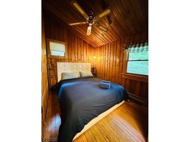 This exceptionally charming fully furnished lake-house is - photo 12