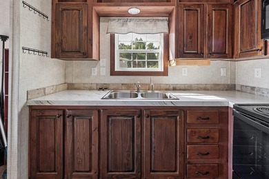 Located on the shores of beautiful Lake Higginbotham in - photo 12