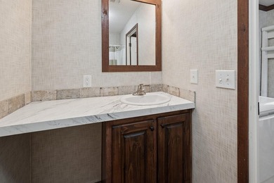 Located on the shores of beautiful Lake Higginbotham in - photo 15