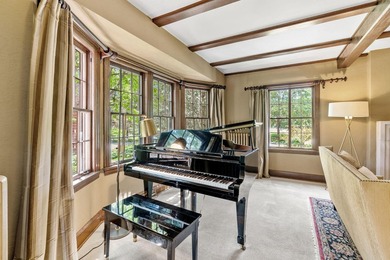 This exceptional 1928 Tudor is nestled in the sought-after - photo 16