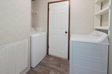 Located on the shores of beautiful Lake Higginbotham in - photo 18