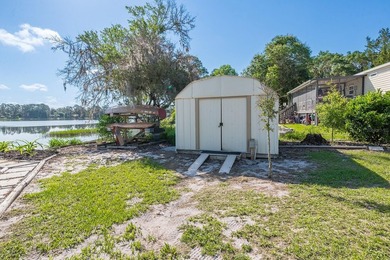 Located on the shores of beautiful Lake Higginbotham in - photo 20