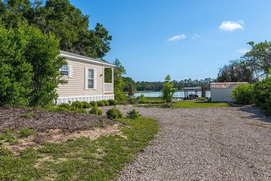 Located on the shores of beautiful Lake Higginbotham in - photo 21