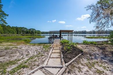 Located on the shores of beautiful Lake Higginbotham in - photo 22