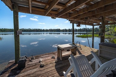 Located on the shores of beautiful Lake Higginbotham in - photo 23