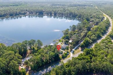 Located on the shores of beautiful Lake Higginbotham in - photo 25