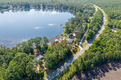Located on the shores of beautiful Lake Higginbotham in - photo 29