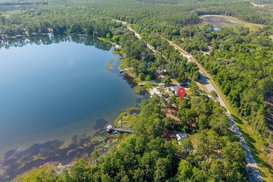 Located on the shores of beautiful Lake Higginbotham in - photo 30