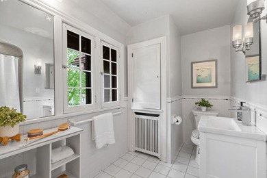 This exceptional 1928 Tudor is nestled in the sought-after - photo 30