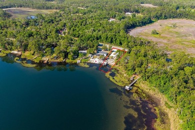 Located on the shores of beautiful Lake Higginbotham in - photo 31
