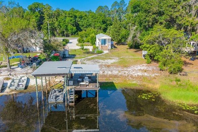 Located on the shores of beautiful Lake Higginbotham in - photo 32