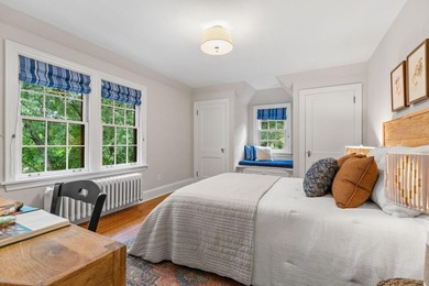 This exceptional 1928 Tudor is nestled in the sought-after - photo 32
