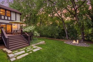 This exceptional 1928 Tudor is nestled in the sought-after - photo 46
