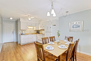 Welcome to this bright two-bedroom, two-bath villa in Hilton - photo 5