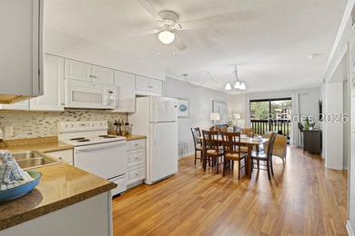 Welcome to this bright two-bedroom, two-bath villa in Hilton - photo 7