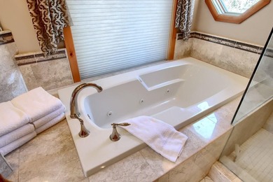 Experience mountain elegance and lake living in this custom 3 - photo 31