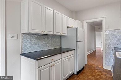 This corner unit is located on the top floor of the historic - photo 10
