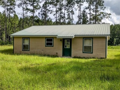 (private lake, pond, creek) Home For Sale in Chiefland Florida