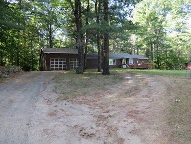 Tucked away in the serene woods of the Ausable Acres subdivision - photo 2