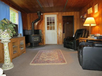 Tucked away in the serene woods of the Ausable Acres subdivision - photo 9
