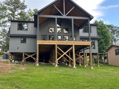 New construction, 90% complete, 2600 sf luxurious lake front - Lake Home For Sale in Hemphill, Texas