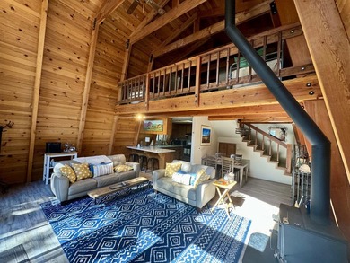 Escape to your own cozy cabin tucked away in the serene woods of - photo 11