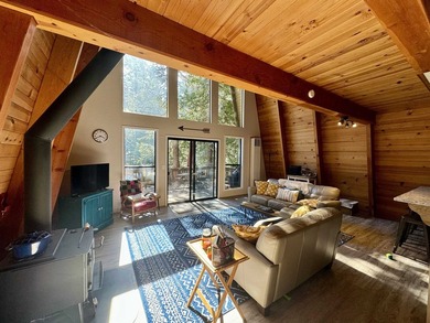 Escape to your own cozy cabin tucked away in the serene woods of - photo 12