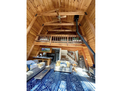 Escape to your own cozy cabin tucked away in the serene woods of - photo 14