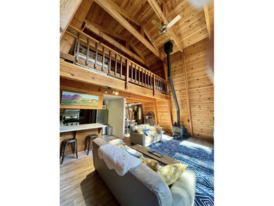Escape to your own cozy cabin tucked away in the serene woods of - photo 16