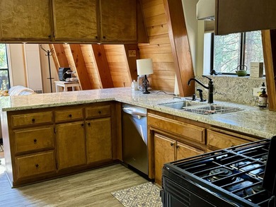 Escape to your own cozy cabin tucked away in the serene woods of - photo 17