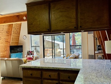 Escape to your own cozy cabin tucked away in the serene woods of - photo 18