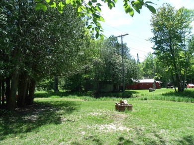Looking for an Up North waterfront getaway with potential? This - photo 25