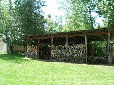Looking for an Up North waterfront getaway with potential? This - photo 30