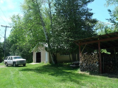 Looking for an Up North waterfront getaway with potential? This - photo 31