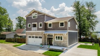 Lake Home For Sale in Eau Claire, Michigan