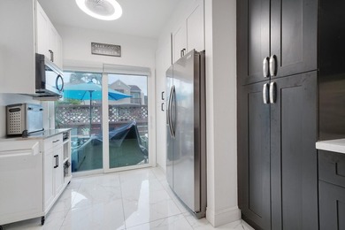 Welcome to this beautifully maintained two-story townhouse in - photo 14