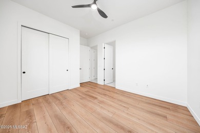 A shining new home in the Catalina Foothills. Located within