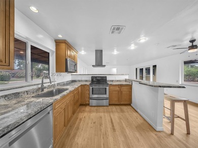 Large and Updated canal front pool home with dock on oversized - photo 6