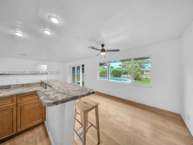 Large and Updated canal front pool home with dock on oversized - photo 8
