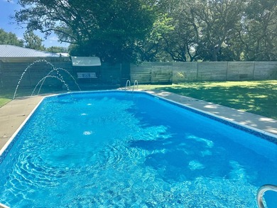 Beautifully updated 4BR/3.5BA coastal home on a prime .34-acre - photo 3