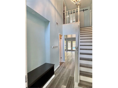 Beautifully updated 4BR/3.5BA coastal home on a prime .34-acre - photo 4