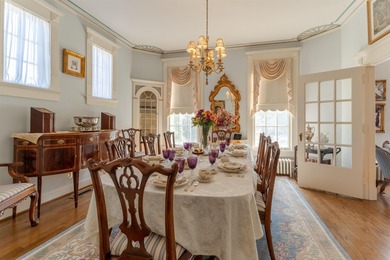 The Magnolia House on Main Nestled among stately columns and - photo 22