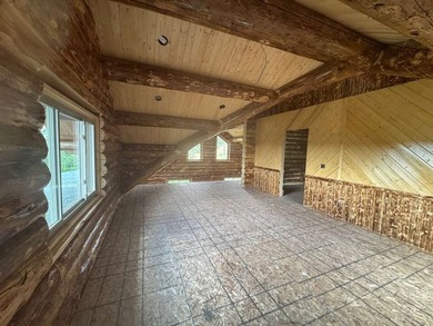 Discover the potential of this stunning log home currently under - photo 22