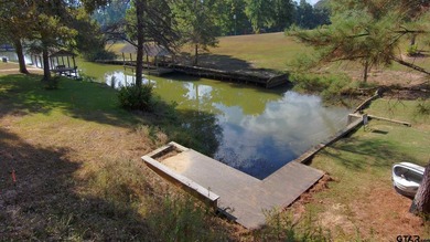 Own 50 feet of water access with this half acre property on Lake - photo 2