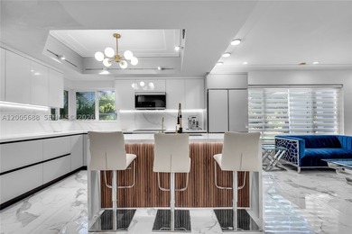 Discover this beautiful Miami Shores home for sale featuring 5 - photo 3
