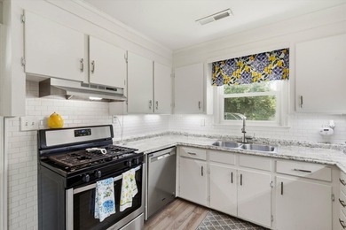 Welcome home to this charming brick residence nestled on a quiet - photo 11