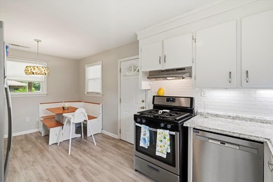 Welcome home to this charming brick residence nestled on a quiet - photo 14