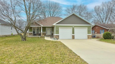Welcome to this charming single-family residence that offers a - Lake Home For Sale in Santa Claus, Indiana